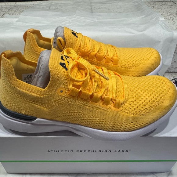 APL Women’s Techloom Breeze in Bright Marigold/White Athletic Shoes - Picture 1 of 7